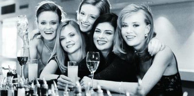 Getty Images/Lifesize/Getty Images An outfit that's fun, festive and feminine is the ideal attire for bridesmaids at a bachelorette party.