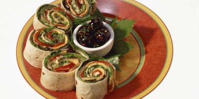 Jupiterimages/Comstock/Getty Images A wrap in a corn tortilla makes an easy gluten-free lunch.