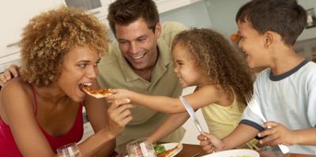 BananaStock/BananaStock/Getty Images Individual pizzas can satisfy everyone.
