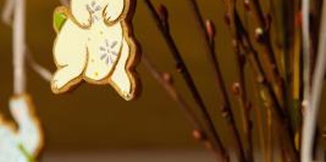 Jupiterimages/Photos.com/Getty Images Use paint or markers to decorate Easter-themed wooden cut-outs.