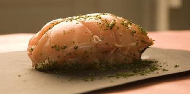 Jupiterimages/Photos.com/Getty Images Pork roasts are a great centerpiece for a family dinner.