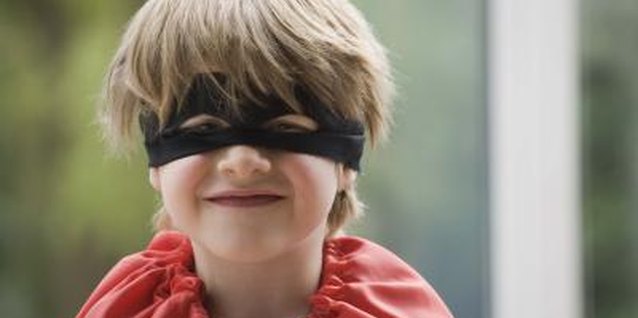 Jupiterimages/BananaStock/Getty Images He enjoys pretending to be a superhero saving the world.