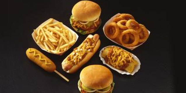 Jupiterimages/Comstock/Getty Images Certain things motivate you eat unhealthy foods.