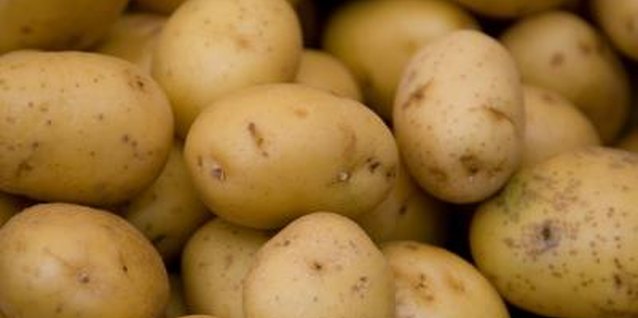 Jupiterimages/Photos.com/Getty Images Baked potatoes are a good compliment to roast meats.