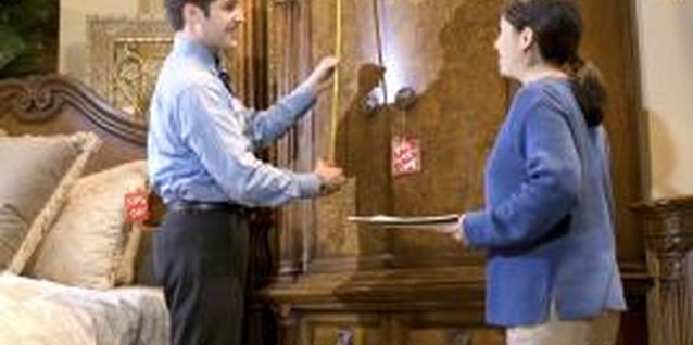 Thinkstock/Comstock/Getty Images Grab an armoire on clearance for a solid storage piece before the category disappears like the dinosaurs.