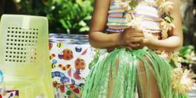 Stockbyte/Stockbyte/Getty Images A luau birthday celebration will be memorable for your little one and her friends..