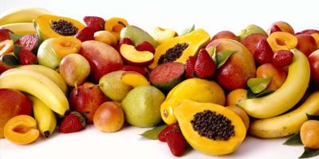 Jupiterimages/Comstock/Getty Images Many fruit trees are available in dwarf varieties for container growing.
