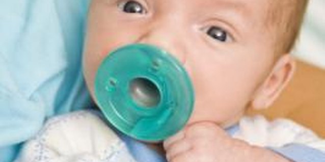Dynamic Graphics/Creatas/Getty Images It's usually safe to use lotion on your newborn baby.