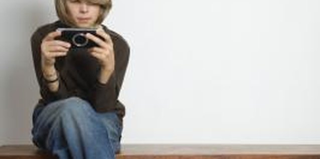 Jupiterimages/Polka Dot/Getty Images Some teens become too dependent on gaming, leading to isolation.