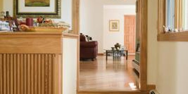 Jupiterimages/Stockbyte/Getty Images Baseboard heating will keep the lower part of your house warmer.