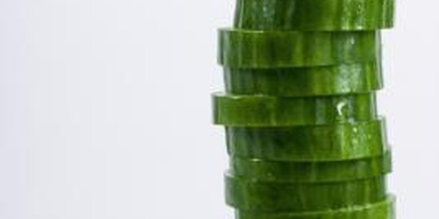 Jupiterimages/Polka Dot/Getty Images Use cucumbers to create cool crafts with your children.