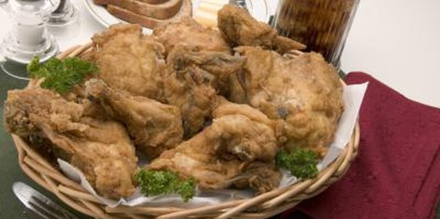 Jupiterimages/liquidlibrary/Getty Images Use baking mix or flour to create delicious fried chicken.