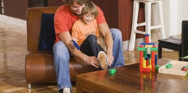 Jupiterimages/Polka Dot/Getty Images Your child's shoes should fit properly for both comfort and safety.