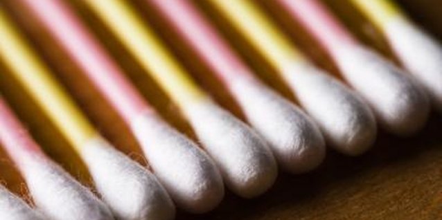 Jupiterimages/Photos.com/Getty Images Dip cotton swabs in rubbing alcohol to kill mealybugs.