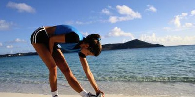Steve Mason/Stockbyte/Getty Images Warming up before working out can prevent injuries and improve performance.