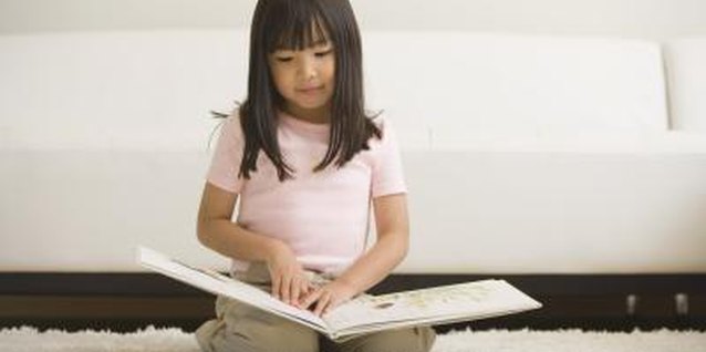 Brand X Pictures/Brand X Pictures/Getty Images Make reading a priority in your home.