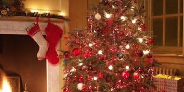 Max Oppenheim/Digital Vision/Getty Images A pre-lit Christmas tree eliminates the seasonal task of stringing lights around it.