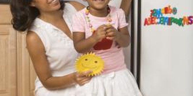 Jupiterimages/Creatas/Getty Images Surprise your little girl with a mommy-daughter bonding day in Orlando.