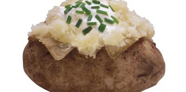 Comstock/Comstock/Getty Images A medium baked potato with the skin on provides you with 926 milligrams of potassium.