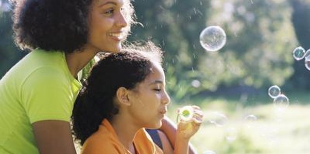 BananaStock/BananaStock/Getty Images Parental responsiveness affects a child's development.
