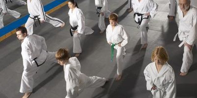 Hemera Technologies/AbleStock.com/Getty Images Martial arts classes taken by parents with their children sets a positive example and reinforces class benefits.