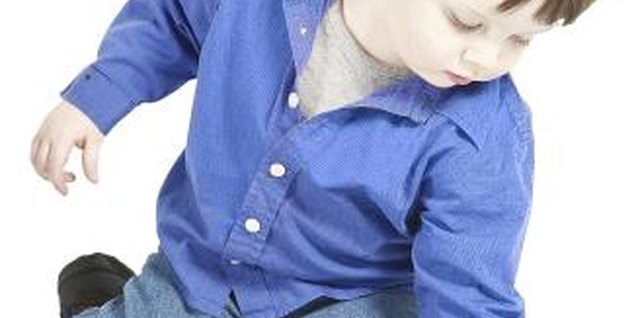 Hemera Technologies/PhotoObjects.net/Getty Images Purchase clothing for your toddler that is both cute and safe.