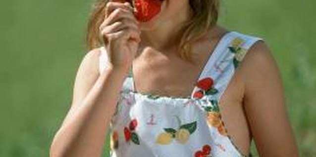 Goodshoot/Goodshoot/Getty Images Spiral strawberry planters provide easy access to the juicy fruits.