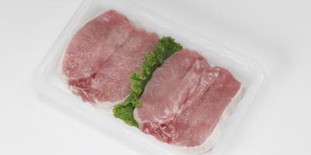 Jupiterimages/liquidlibrary/Getty Images Use boneless chops to cut tenders.