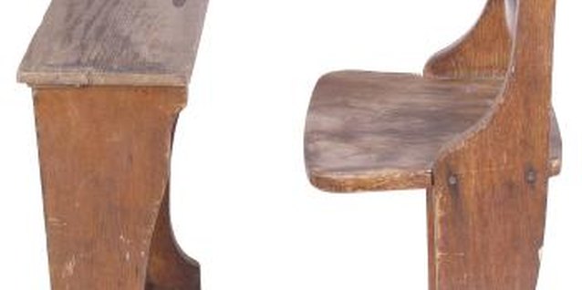Hemera Technologies/PhotoObjects.net/Getty Images Change the appearance of a desk by distressing the surface.