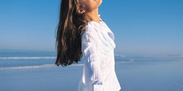 Goodshoot/Goodshoot/Getty Images A linen shirt feels cool on the skin on hot summer days.
