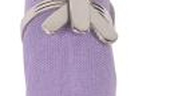 Hemera Technologies/PhotoObjects.net/Getty Images Slip a handmade cloth napkin into a napkin ring for instant style.