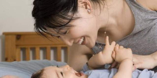 Jupiterimages/Creatas/Getty Images Being playful with your baby will help her learn the importance of human connection.