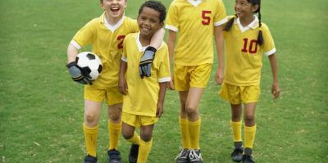 Stockbyte/Stockbyte/Getty Images Help him enjoy sports just as much off the field as on the field.