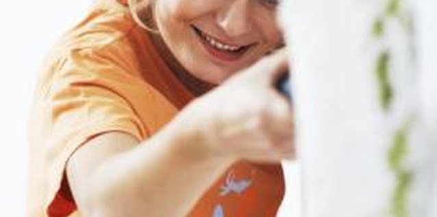 Getty Images/Photodisc/Getty Images Repairing a scrape or hole in the drywall caused by a chair is a simple process.