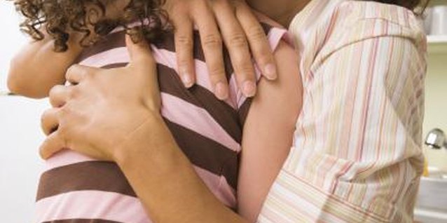 Jupiterimages/Creatas/Getty Images Spend time playing with your child to develop his affection.