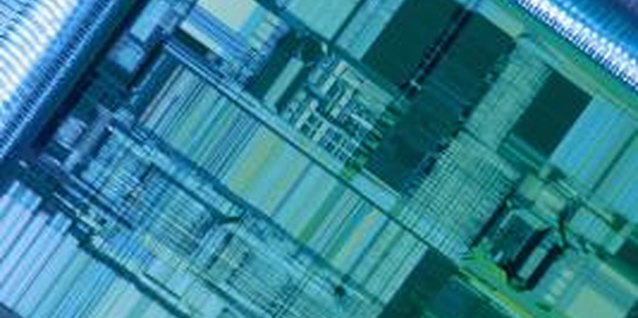 Comstock/Comstock/Getty Images Under the hood, chips move binary bits at the speed of light.