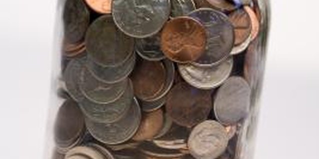 Comstock Images/Comstock/Getty Images Gain admirers of your coin collection by putting it on display.