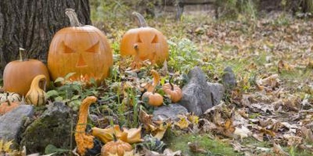 Jupiterimages/Creatas/Getty Images Pumpkins -- easy to find, easy to make into scary decorations.