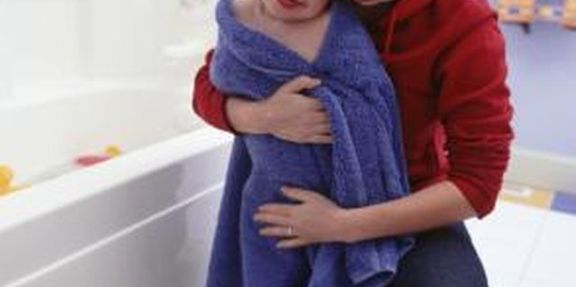 Ryan McVay/Photodisc/Getty Images Preschoolers are old enough to handle some aspects of bath time themselves.