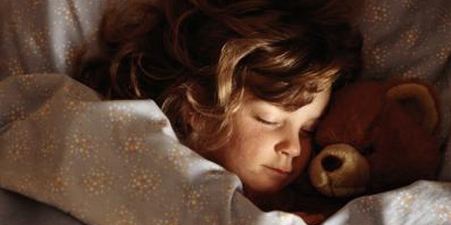 David De Lossy/Digital Vision/Getty Images Your child needs plenty of rest to stay healthy.