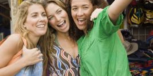 Jupiterimages/Creatas/Getty Images True friends will bring happiness to your life and reduce your levels of stress.