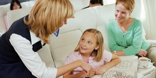 Digital Vision/Photodisc/Getty Images Pack activities to entertain your child during your travels.