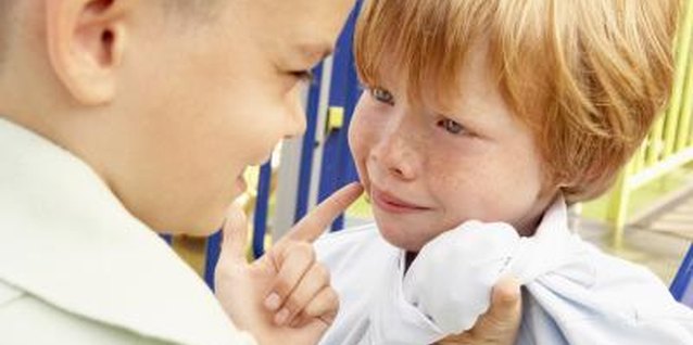 BananaStock/BananaStock/Getty Images A sensitive child may struggle to cope with bullies.