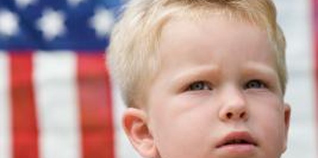Jupiterimages/Photos.com/Getty Images Teach a strong love of country with the words of the Pledge of Allegiance.