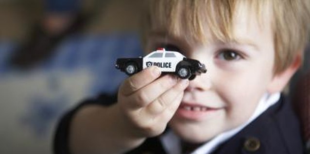 BananaStock/BananaStock/Getty Images Playing with toy cars builds spacial recognition.
