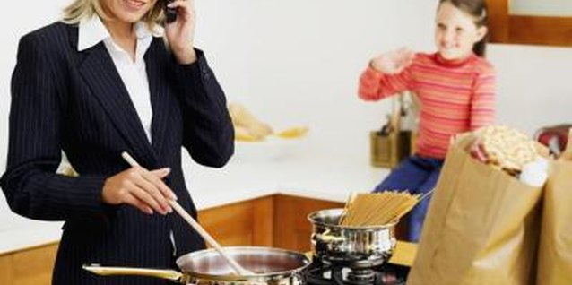Stockbyte/Stockbyte/Getty Images Balancing work and family can become quite a juggling act.
