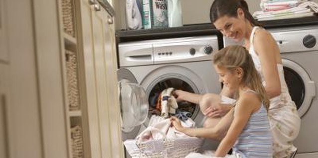 Andrew Olney/Photodisc/Getty Images The washing machine can be a great source of water for plants.