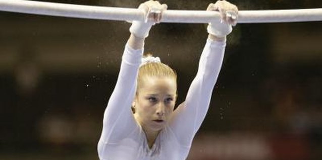 Brian Bahr/Getty Images Sport/Getty Images Build up plenty of speed before you dismount from the bar.