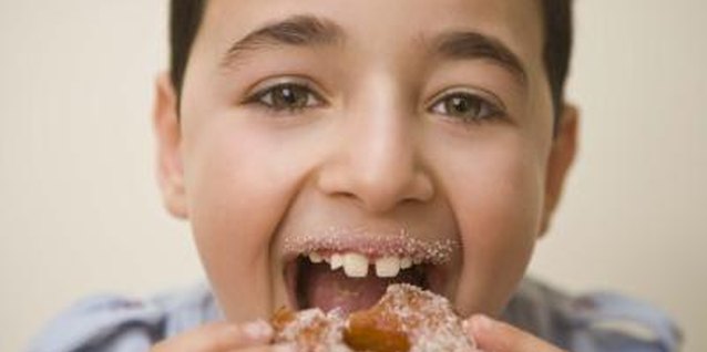 Jupiterimages/BananaStock/Getty Images You can treat the kids to homemade donuts, even if you run out of baking powder.