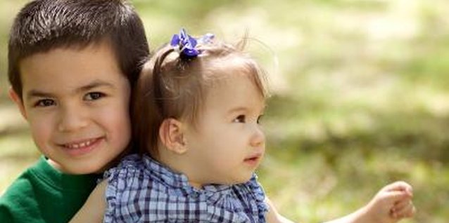 Jupiterimages/Photos.com/Getty Images Your toddler loves his sister, but that doesn't mean he's always nice to her.